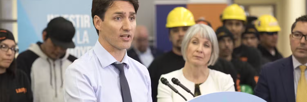 A photograph of Canadian Prime Minister, Justin Trudeau, making a speech.