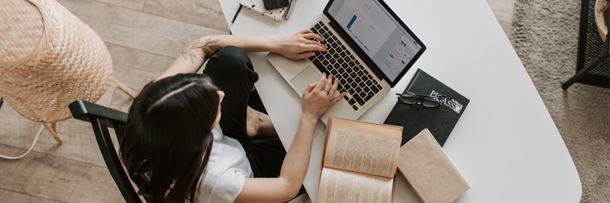 A photograph of a person working from home.