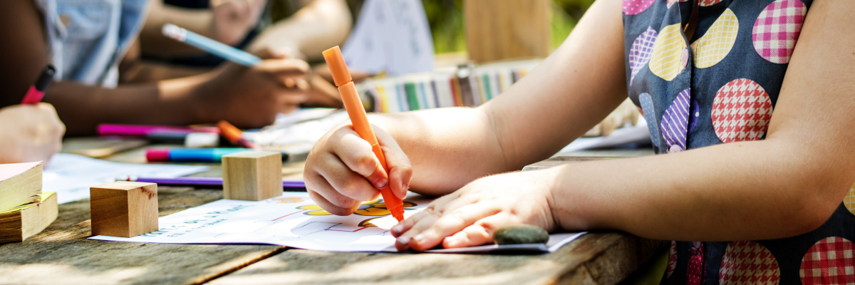 Photographic style image of children colouring