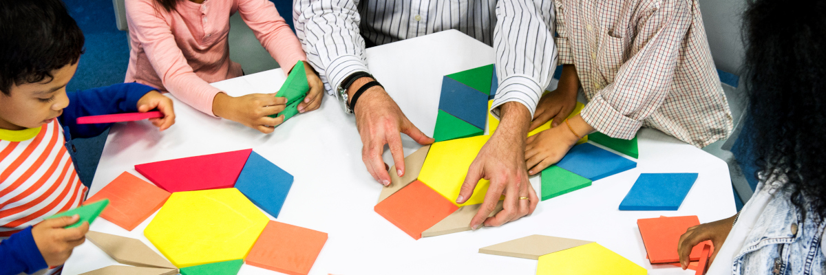 Photographic image of children working on a puzzle