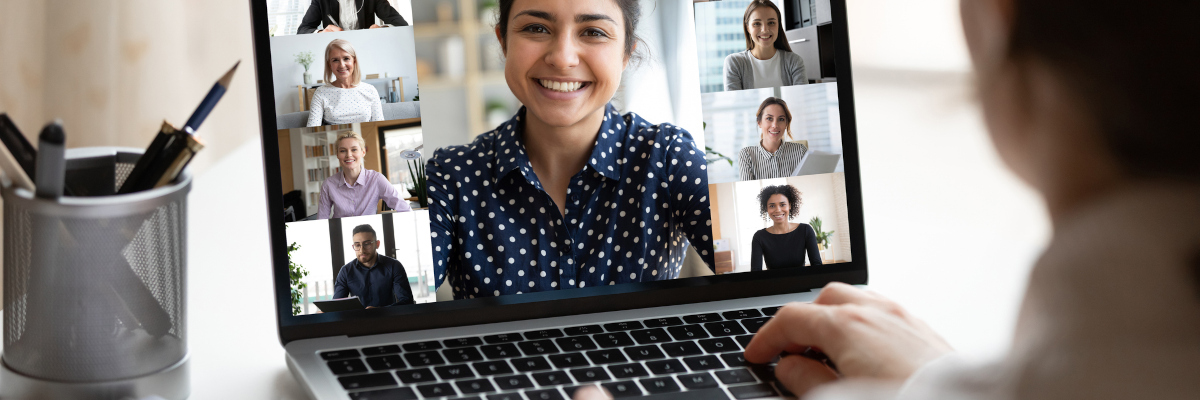 A photographic style image of a woman on a video call.